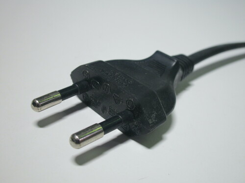 Closeup look at a standard Europlug moulded onto a power cord.