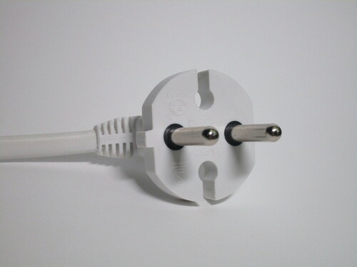 Closeup look of the plug of the power strip.