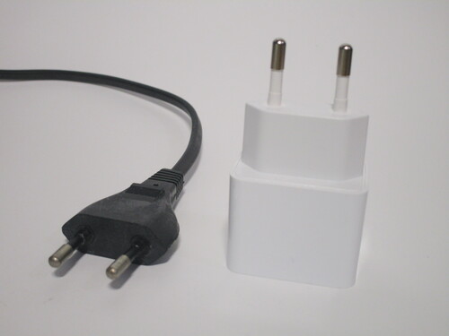 Power cord with moulded Europlug and power brick with Europlug.