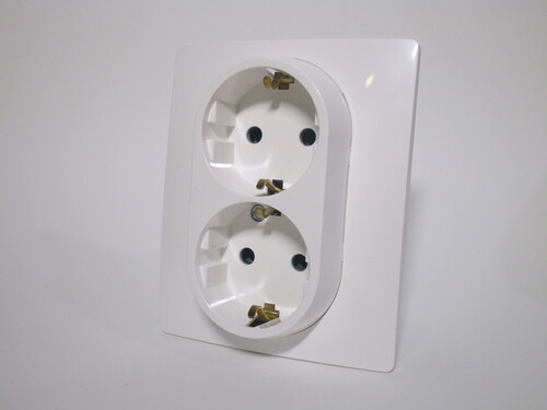 Double power socket - it sticks out slightly more than the single one, but not by much.