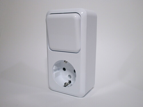 Surface-mount socket with light switch.