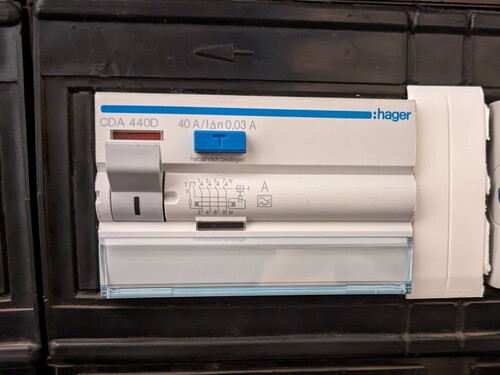 Three-phase RCD made by Hager.