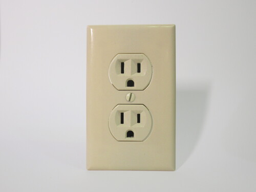 A standard NEMA 5-15R power socket. Two outlets are present, as common in North America.