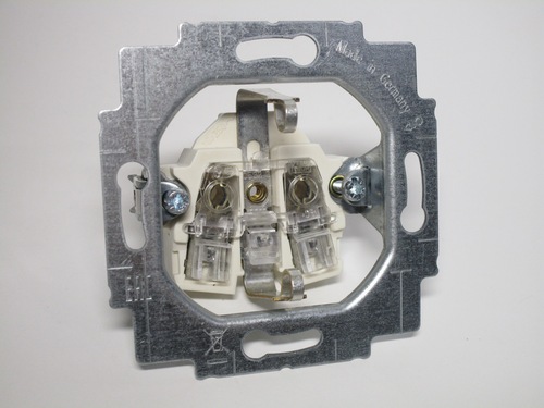 View of the terminals on the push-in socket. Plastic levers are used to remove the wires. The levers also provide protection from the live parts.