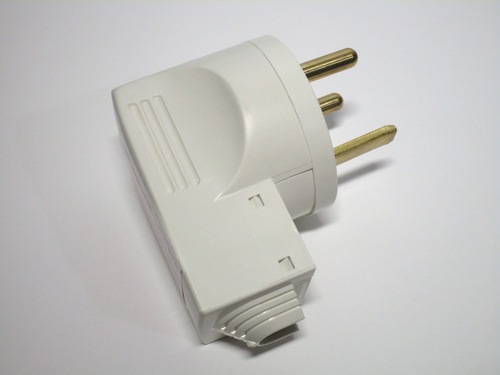 Side view of the French 20A plug. It's made out of white plastic