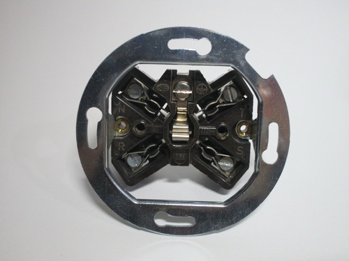 View of the socket without the front cover plate. The wire terminals are visible.