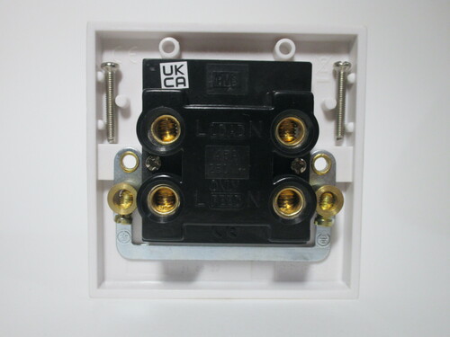 Rear of the isolator switch. Beefy terminals for the line and neutral in and out are present.