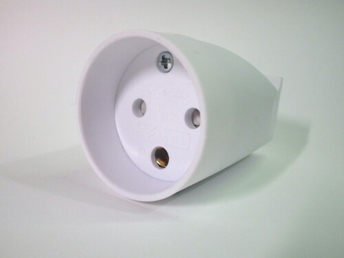 Front view of Danish connector socket. The recess is much deeper than on the wall socket and the earth hole is round rather than semi-circular.