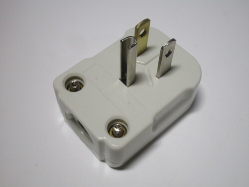 Front view of the plug. The line pin is visibly coloured gold.