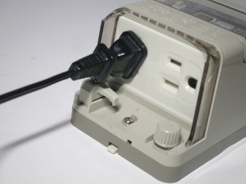 Example of a plug connected to the twist-lock socket of the RCD device.