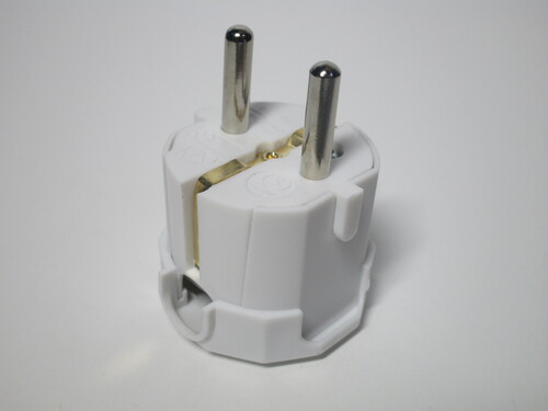 View of the plug. The hole for the power cord is placed on the side.