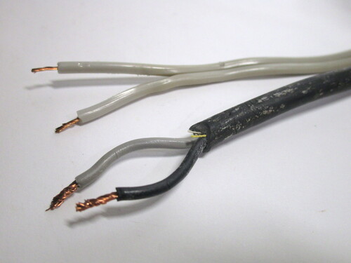 Comparison between a single-insulated and double-insulated cord.